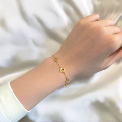 Gold clover cut out bracelet
