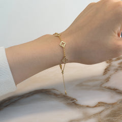 Gold clover cut out bracelet