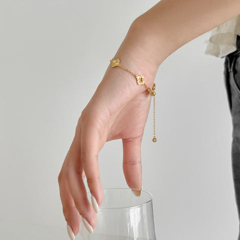 Gold clover cut out bracelet