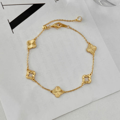 Gold clover cut out bracelet